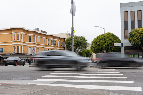 Image shows cars driving down Geary at Commonwealth/Beaumont