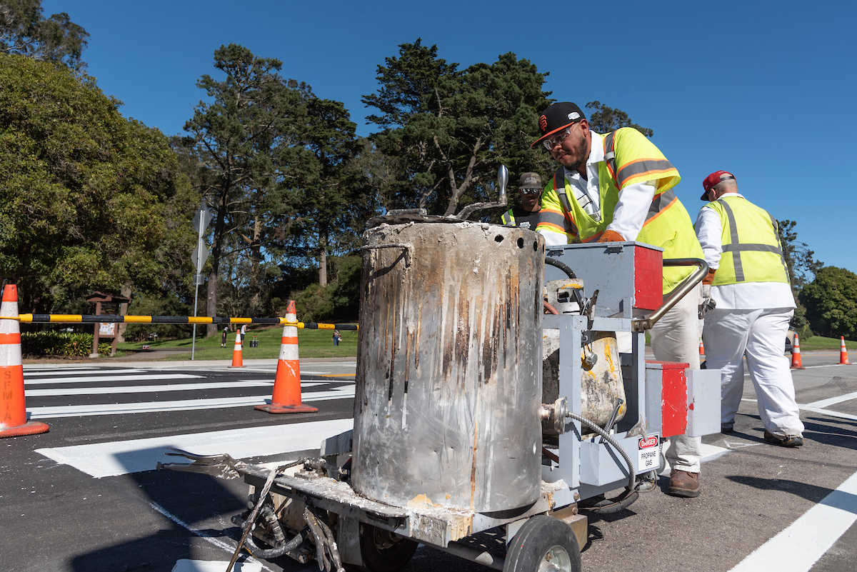 Crosswalks being painted inside Golden Gate Park