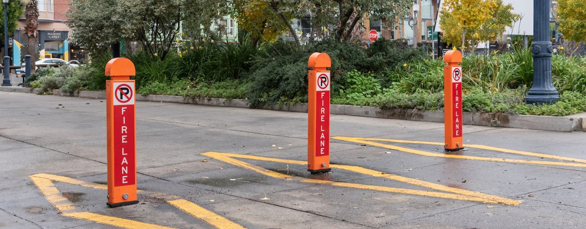 three new collapsible "bollards" used to close street to cars