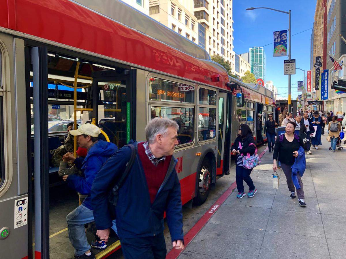 Photo of Customers boarding the bus on 4th Street