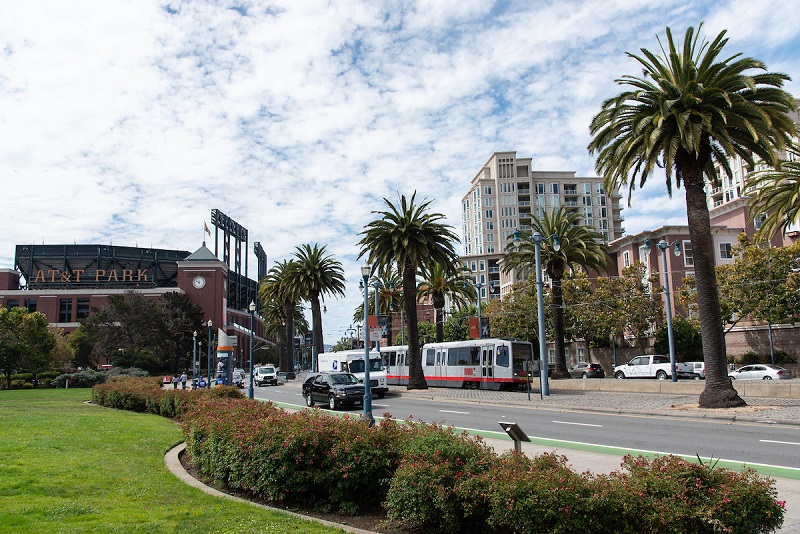 LRV train passing by the ballpark along The Embarcadero