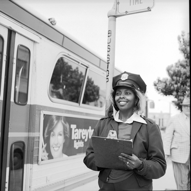 Evelyn Wells with clip board at Muni stop