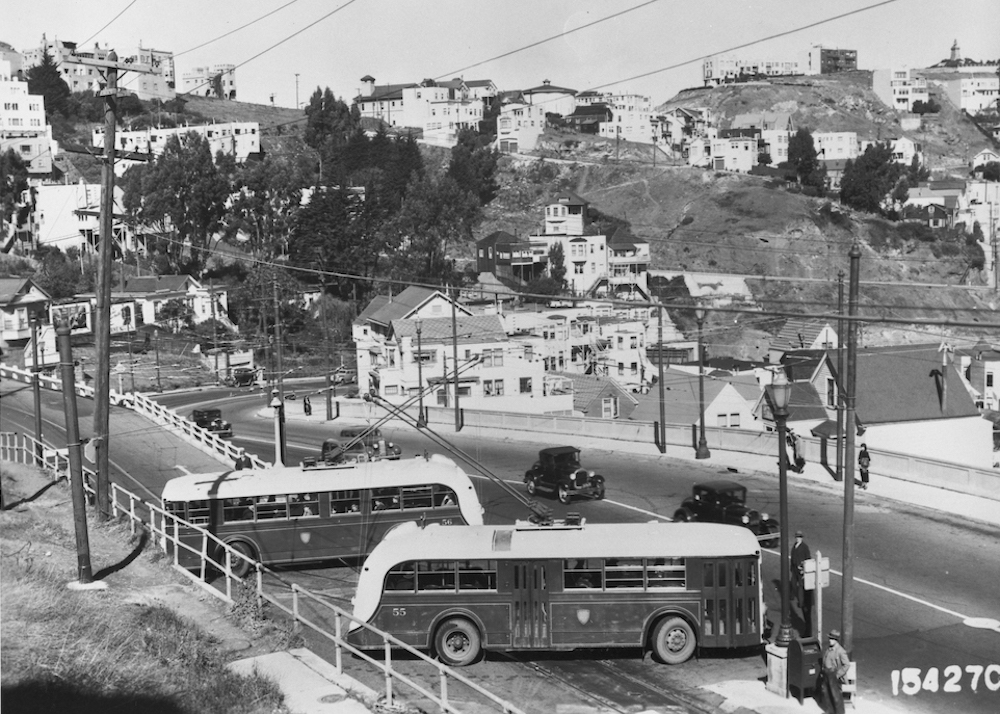 trolley coaches passing each other on Market and Clayton in 1935
