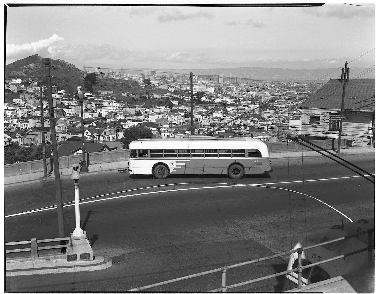 trolley coach with sf skyline in background