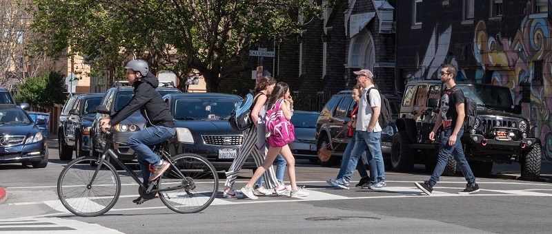 people using crosswalks