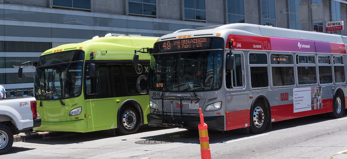 All electric battery bus next to our current Muni coach