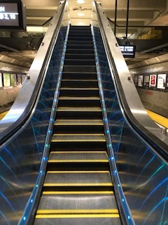 Elevator heading pictured heading up from platform