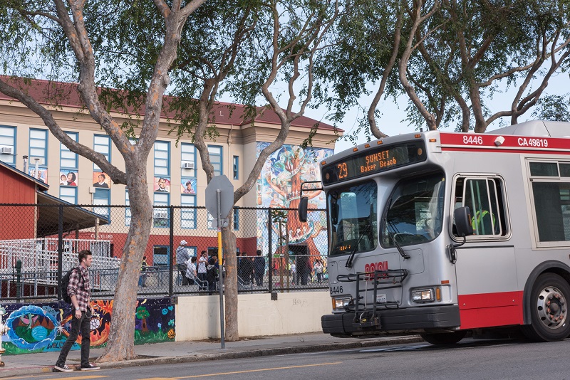 People boarding a coach in the Excelsior 