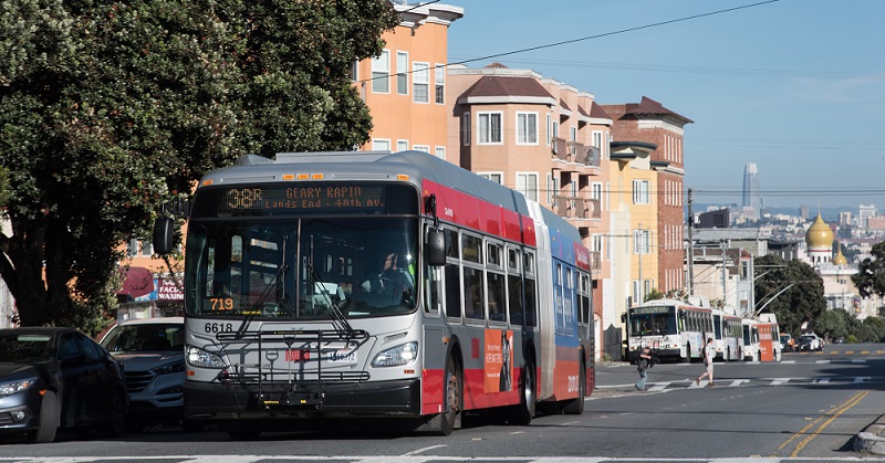 38 Geary coach picking people up in the Richmond.