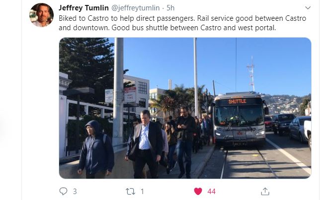 Jeff Tumlin helping people at Castro Station
