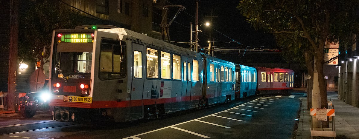 Trains using the Mission Bay Loop on 18th Street