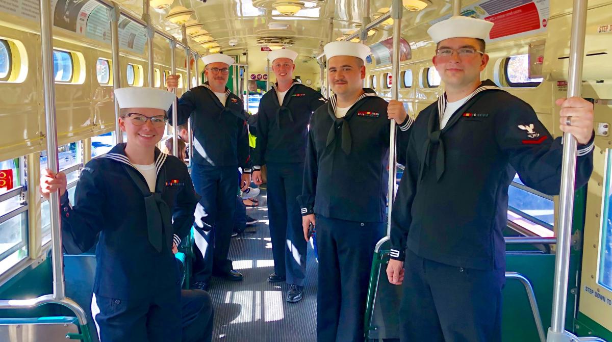 Sailors riding the F Market during Fleetweek