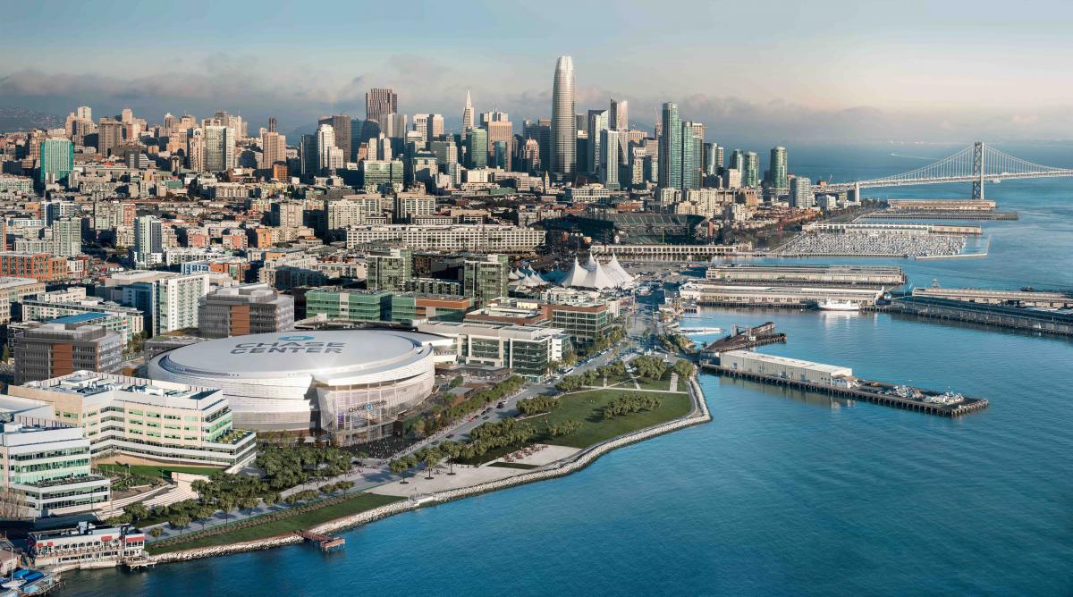 Aerial photo of San Francisco skyline and bay with Chase Center in the foreground