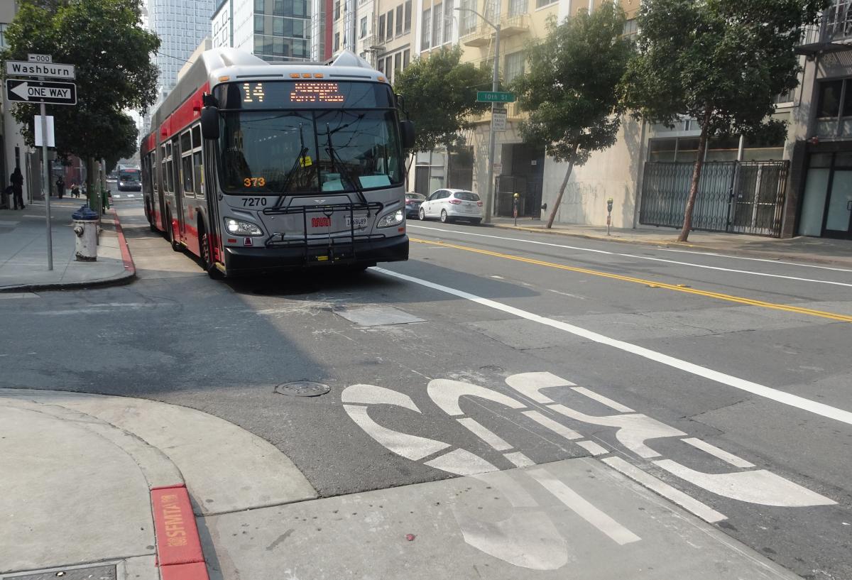 14 Mission bus driving on Mission Street in transit lane 