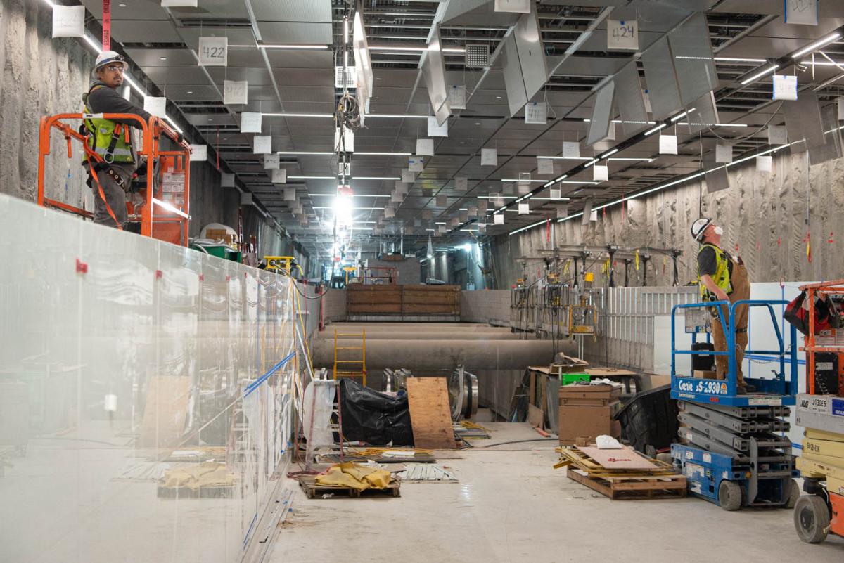 Ceiling panels, lighting, and an LED art installation are being installed inside Union Square/Market Street Station.