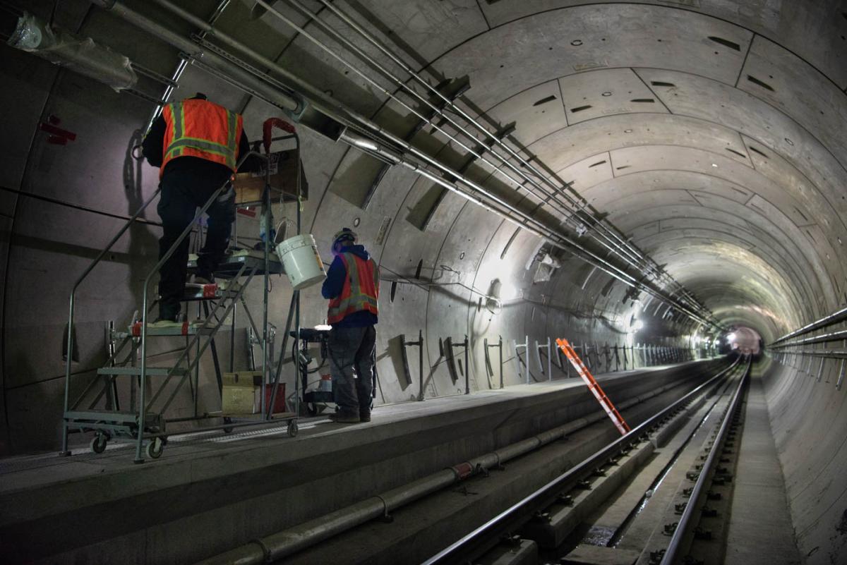 Permanent lighting is being installed inside the northbound tunnel.