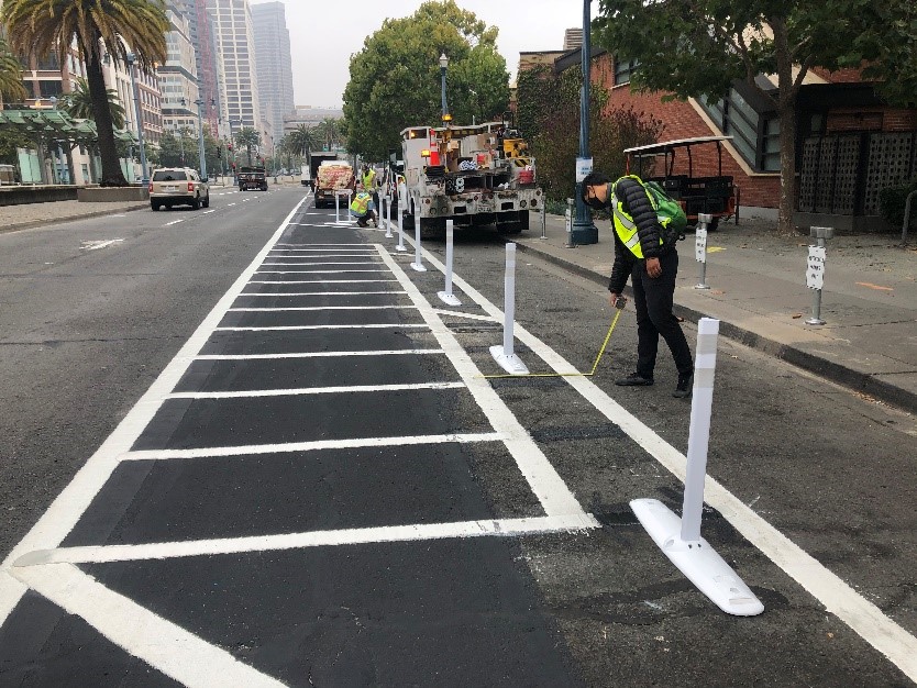SFMTA paint crews adding some motorcycle spaces