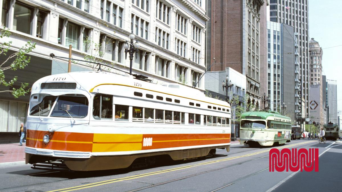 Historic image of M street car riding down Market street