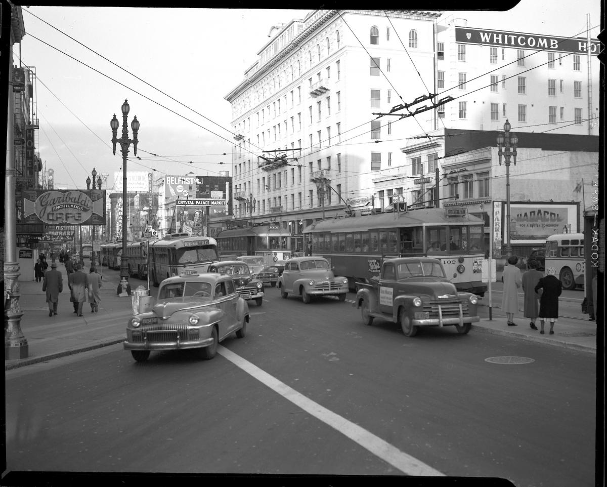 traffic and people waiting for streetcars on market street