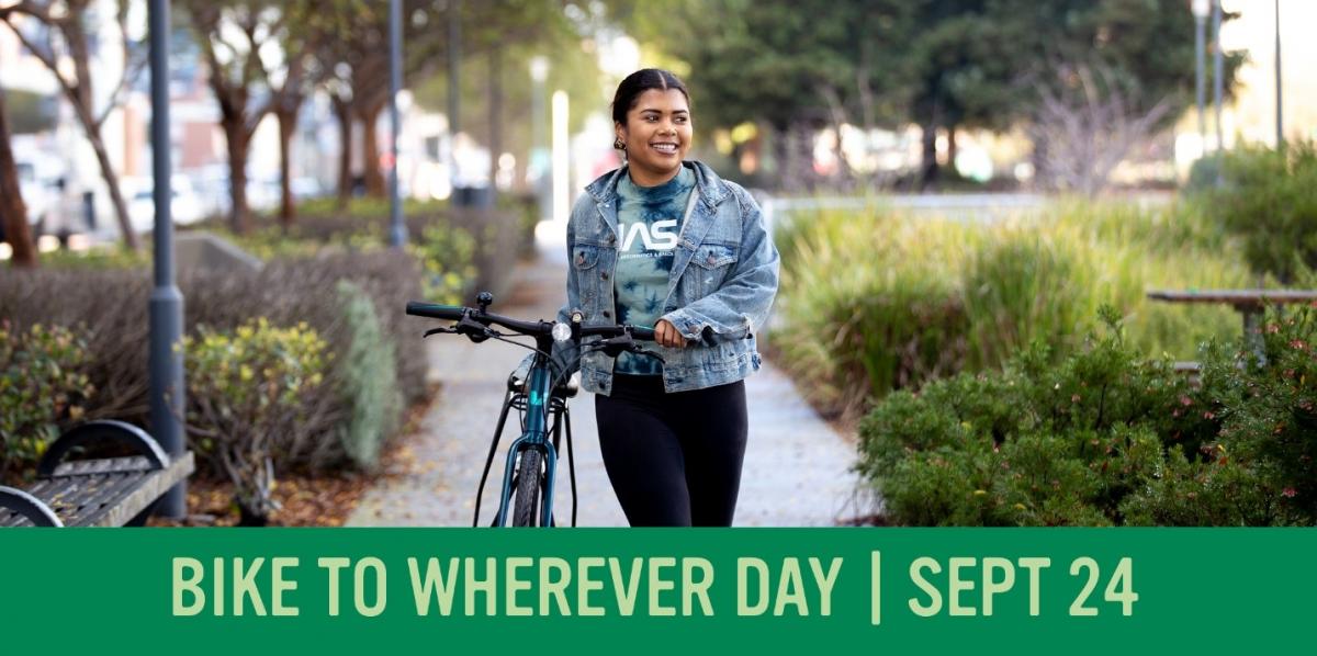 A picture of a woman walking her bicycle above text reading "Bike to Wherever"