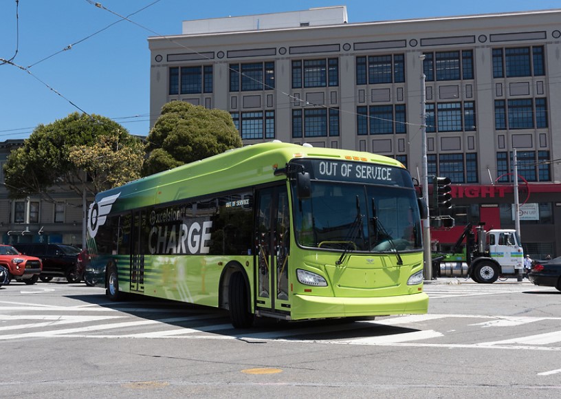 A battery electric bus turns from Mission on to South Van Ness