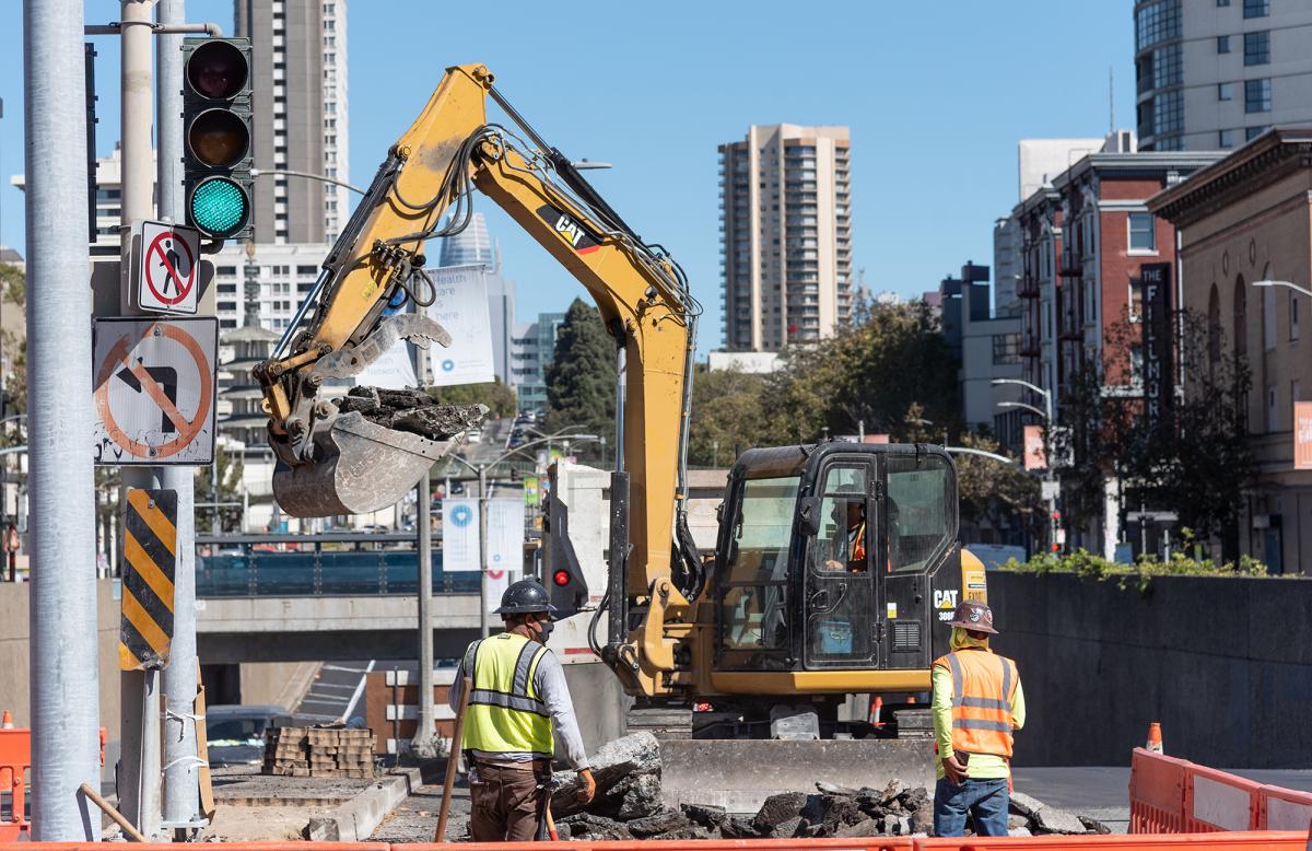 Photo of pedestrian refuge island under construction at Geary Boulevard and Steiner Street as part of the Geary Rapid Project.