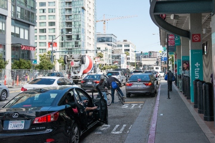 red curb land with traffic