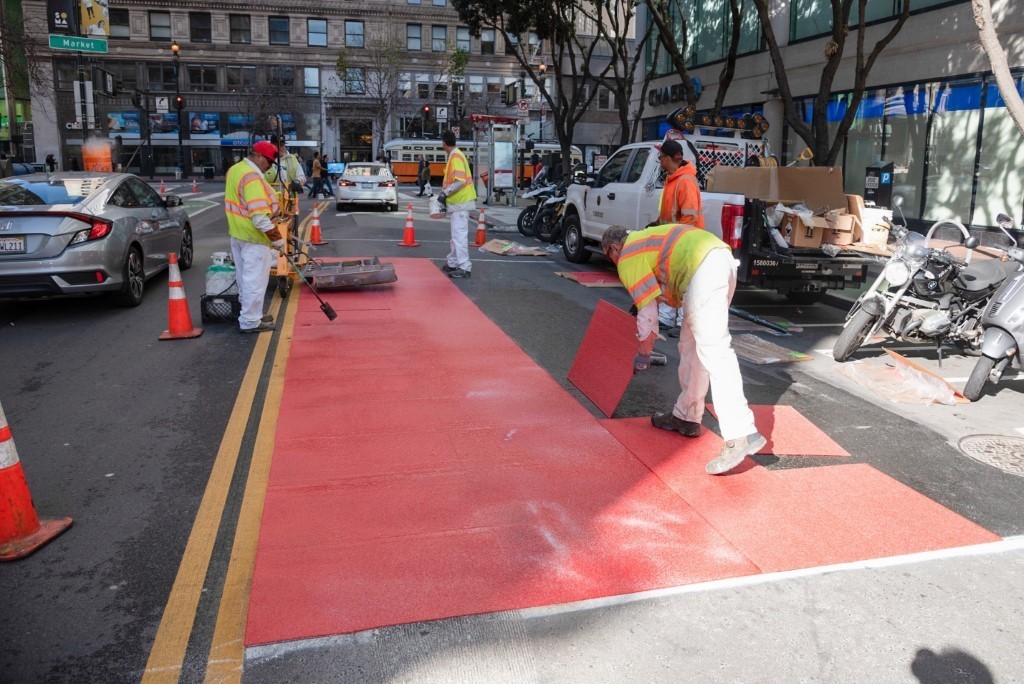 Red Muni lanes getting installed along 2nd Street near Market.