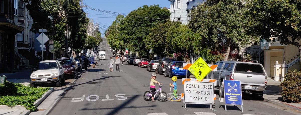 Slow Streets on Lake Street with kids on bikes