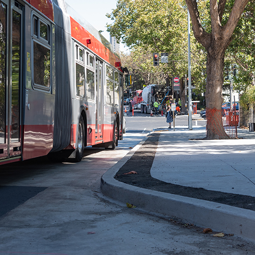 Image of 38 bus pulling up to new bus bulb