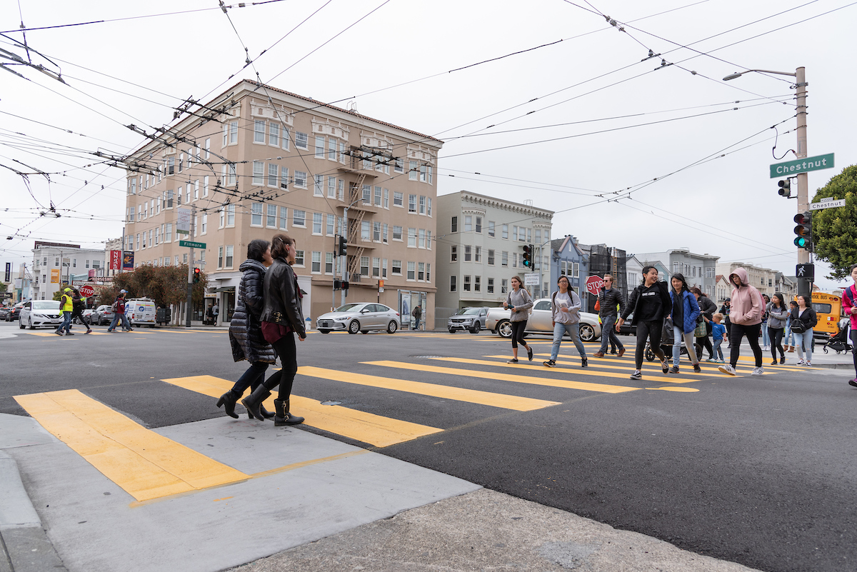 Photo of teenagers in a crosswalk