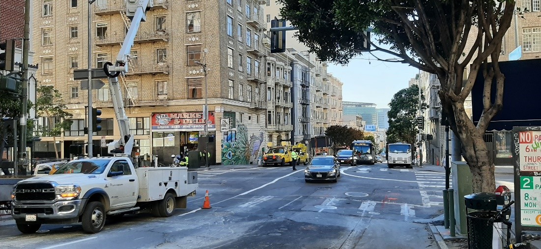 Photo of crews activating a traffic signal 