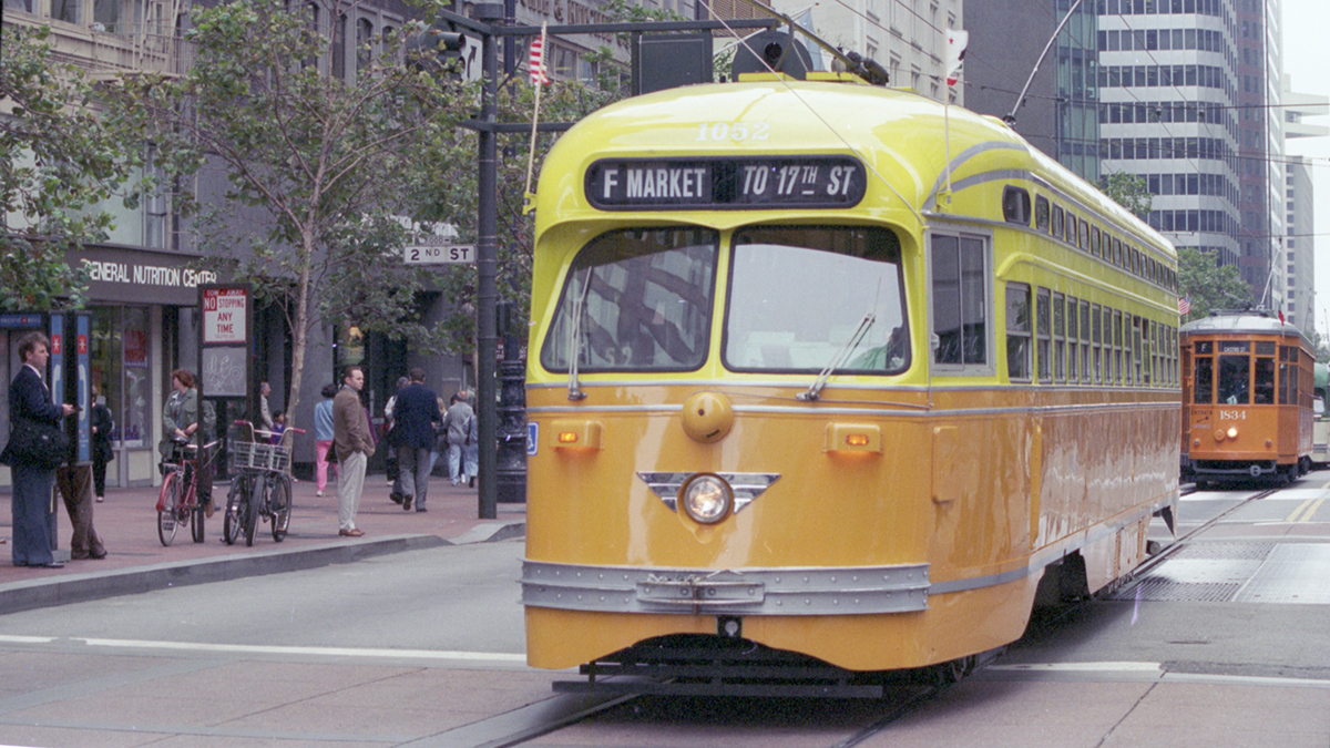 Yellow and orange streetcar on Market street