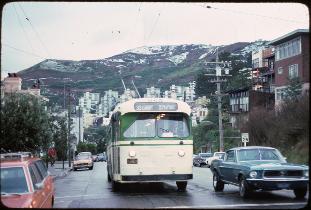 33 Ashbury bus with Twin Peaks in background