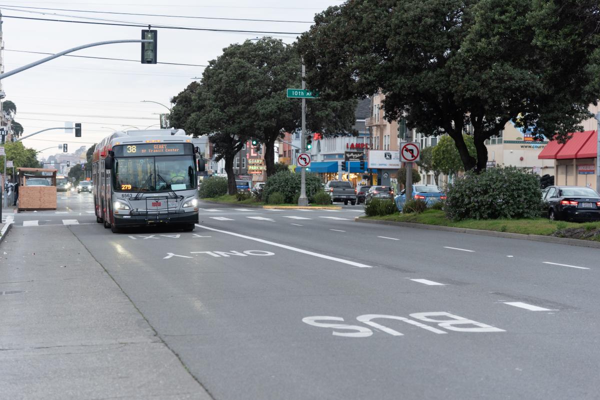 Photo of the 38 Geary bus on a transit lane passing a shared space