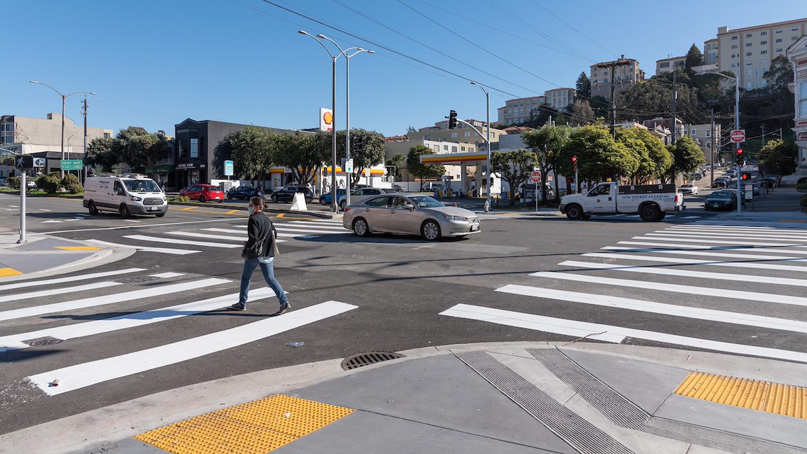 Pedestrian crossing Geary Boulevard in the Richmond