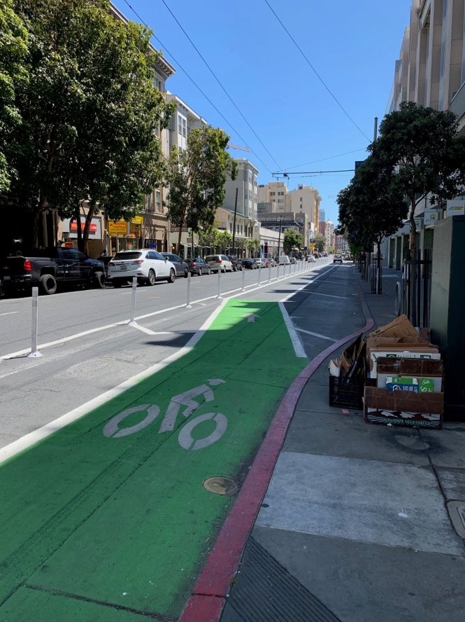 Protected bike lane and active flex space along the 300 block of Golden Gate