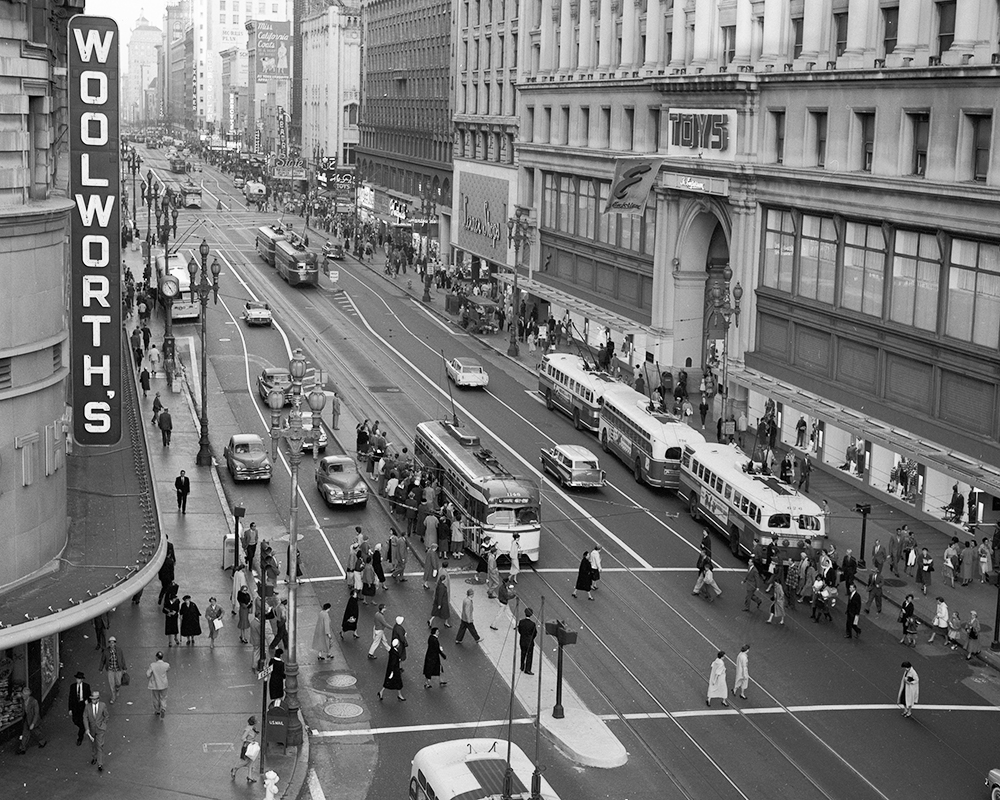 overhead view of streetcars, buses, and pedestrians on Market Street