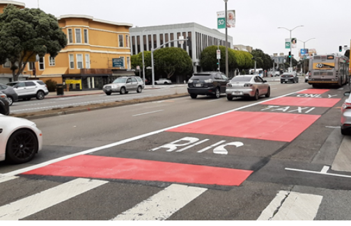 Photo: 38 Geary bus travels inbound past Stanyan Street on newly colorized transit lane.  