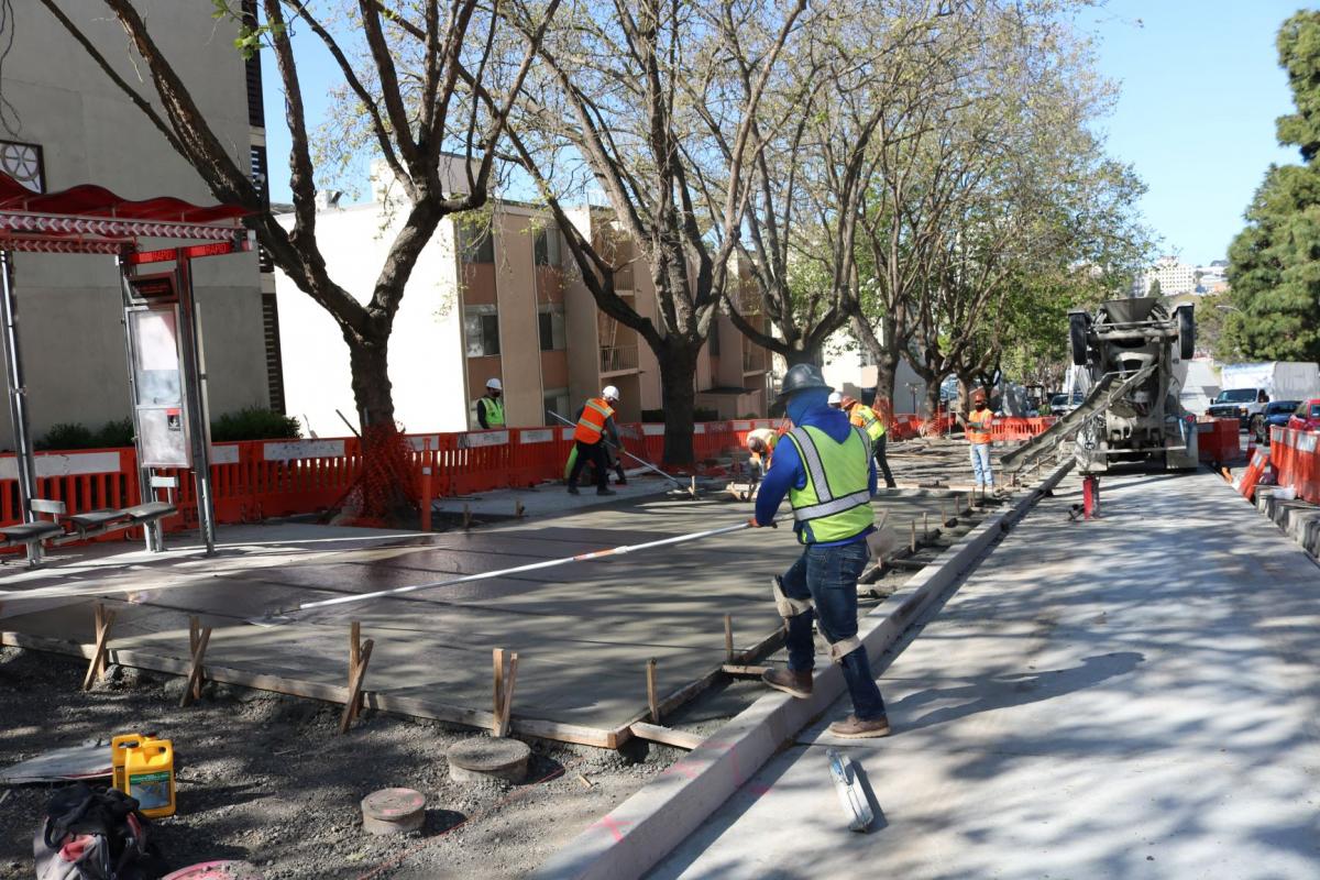 Esquivel Grading and Paving crew members pouring concrete along Geary at Laguna. Photo courtesy of Esquivel Grading and Paving. 