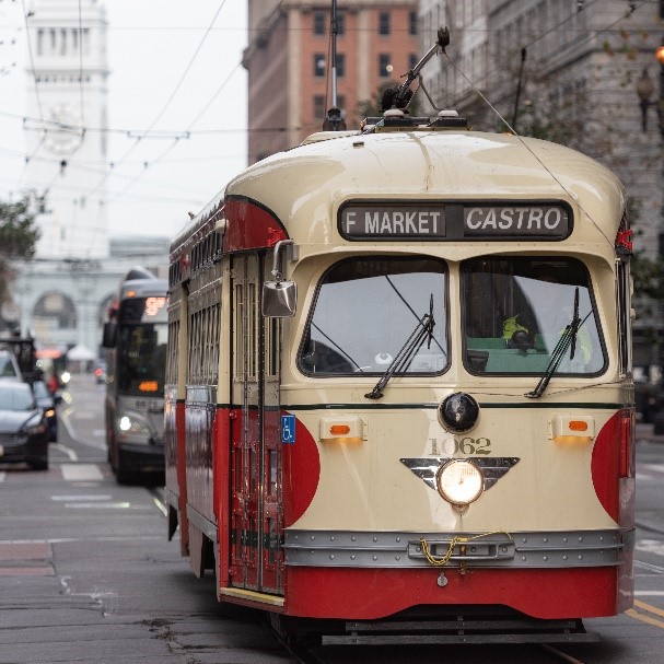 Photo: F Market & Wharves historic streetcar making its way up Market Street from the Ferry Building to Castro.