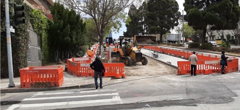    Photo of crews work on new sidewalk bulb-out on Geary at Laguna. 