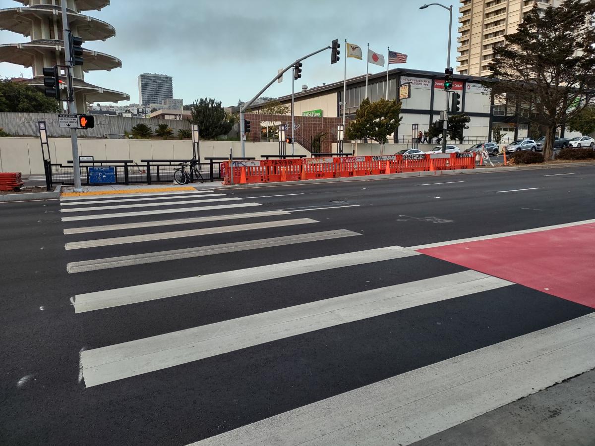 Photo: New crosswalk and pedestrian refuge along Geary Boulevard and Buchanan  