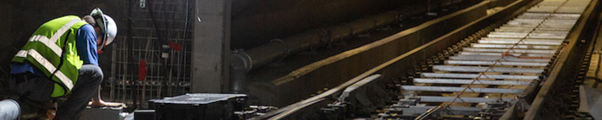 Employee works on construction of the Central Subway tunnel