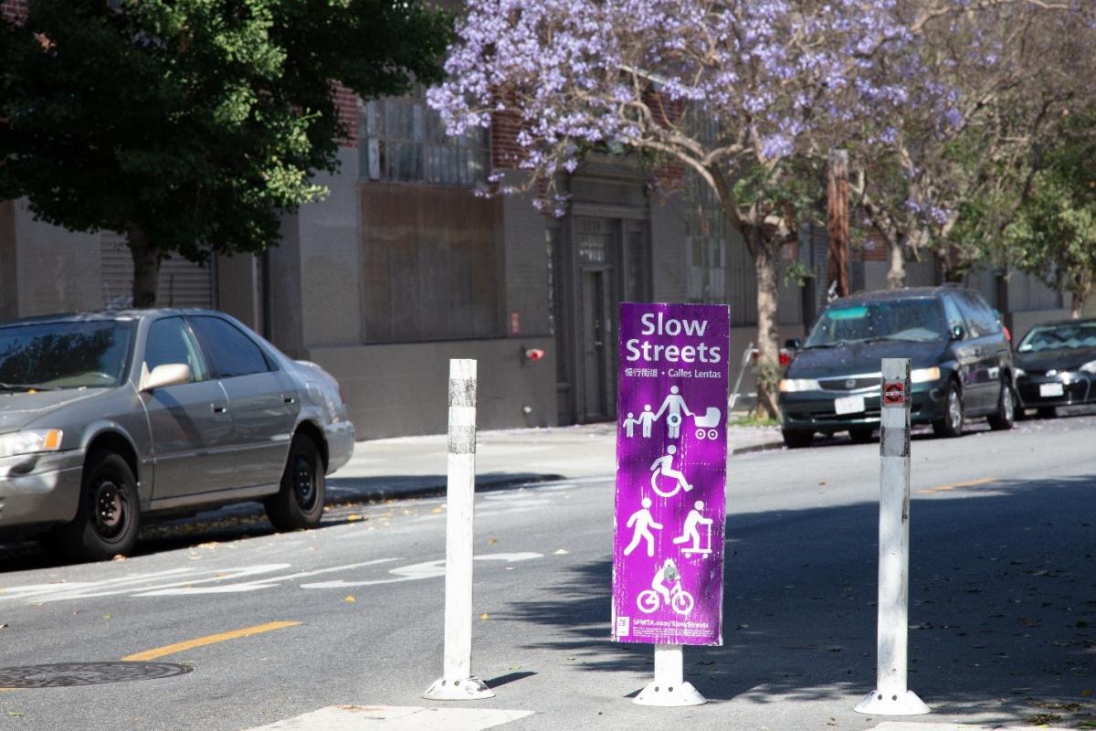 Photo of sign that indicates a slow street is in effect