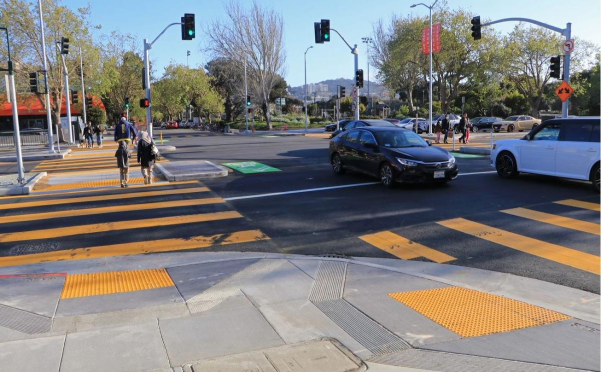 Photo: New crosswalks at the intersection of Geary Boulevard and Steiner Street.  