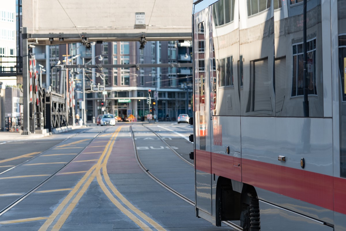 photo of train on a new transit lane on the historic 4th Street Bridge