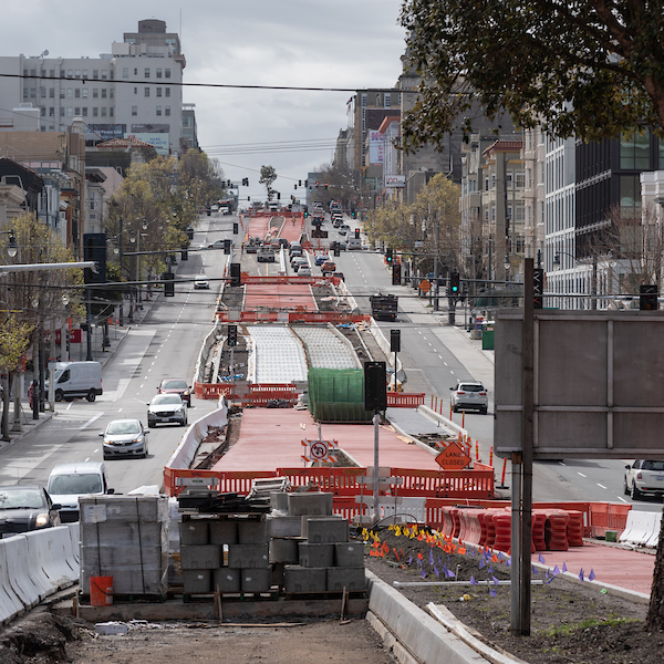 Red concrete for Bus Rapid Transit lanes has been poured along Van Ness between Union and Filbert.