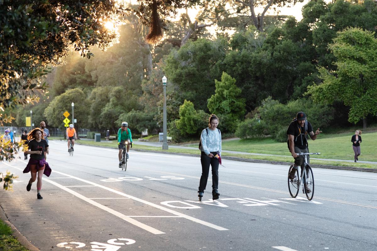 People walking and rolling on JFK Drive in Golden Gate Park