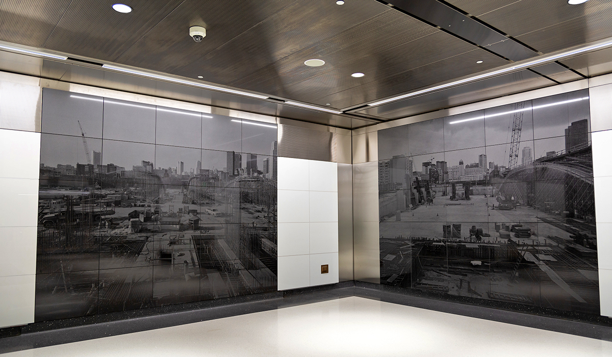 Artwork at concourse level of Yerba Buena / Moscone Station. Large-scale photographs of construction of Moscone center have been laser-etched on granite panels and hung on the walls of the concourse level